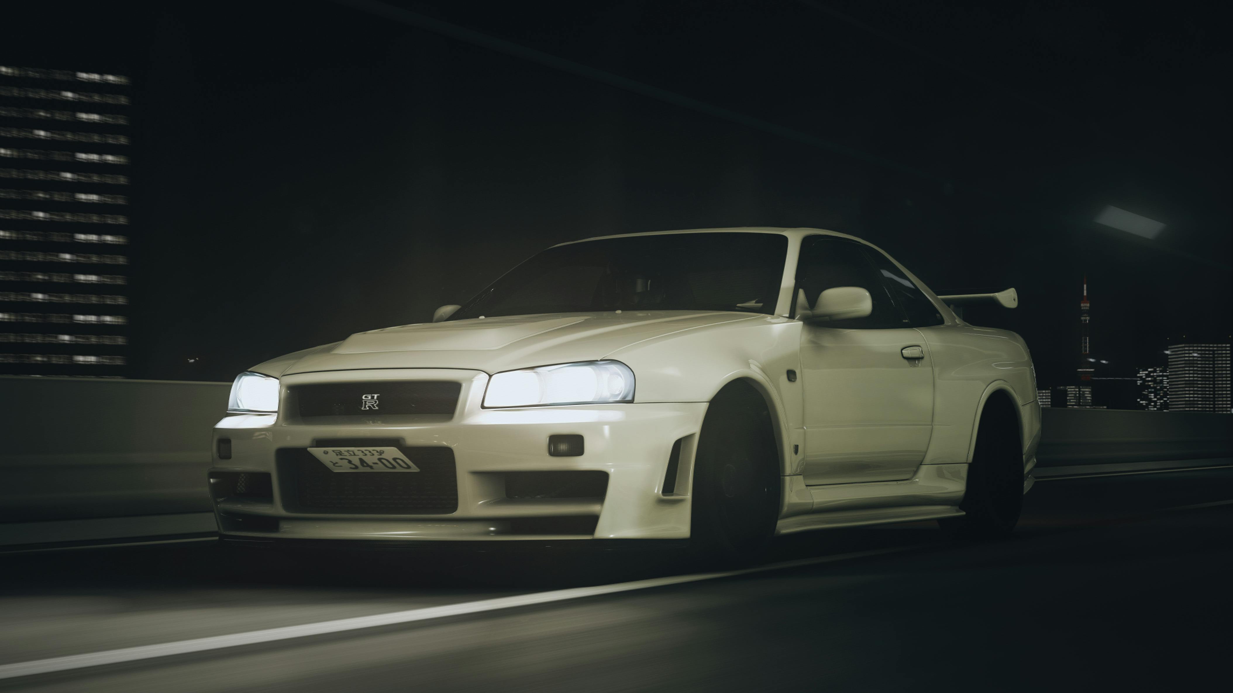 A white Nissan Skyline GT-R (R34) driving through a dark tunnel, with its headlights cutting through the moody atmosphere.